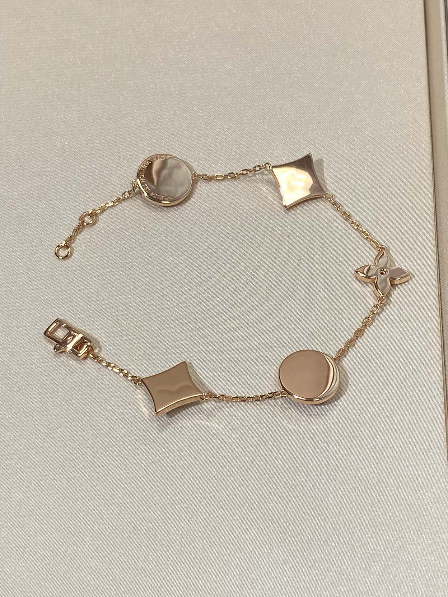 [AuraEcho]STAR AND SUN 5 MOTIF MOP PINK GOLD BRACELET